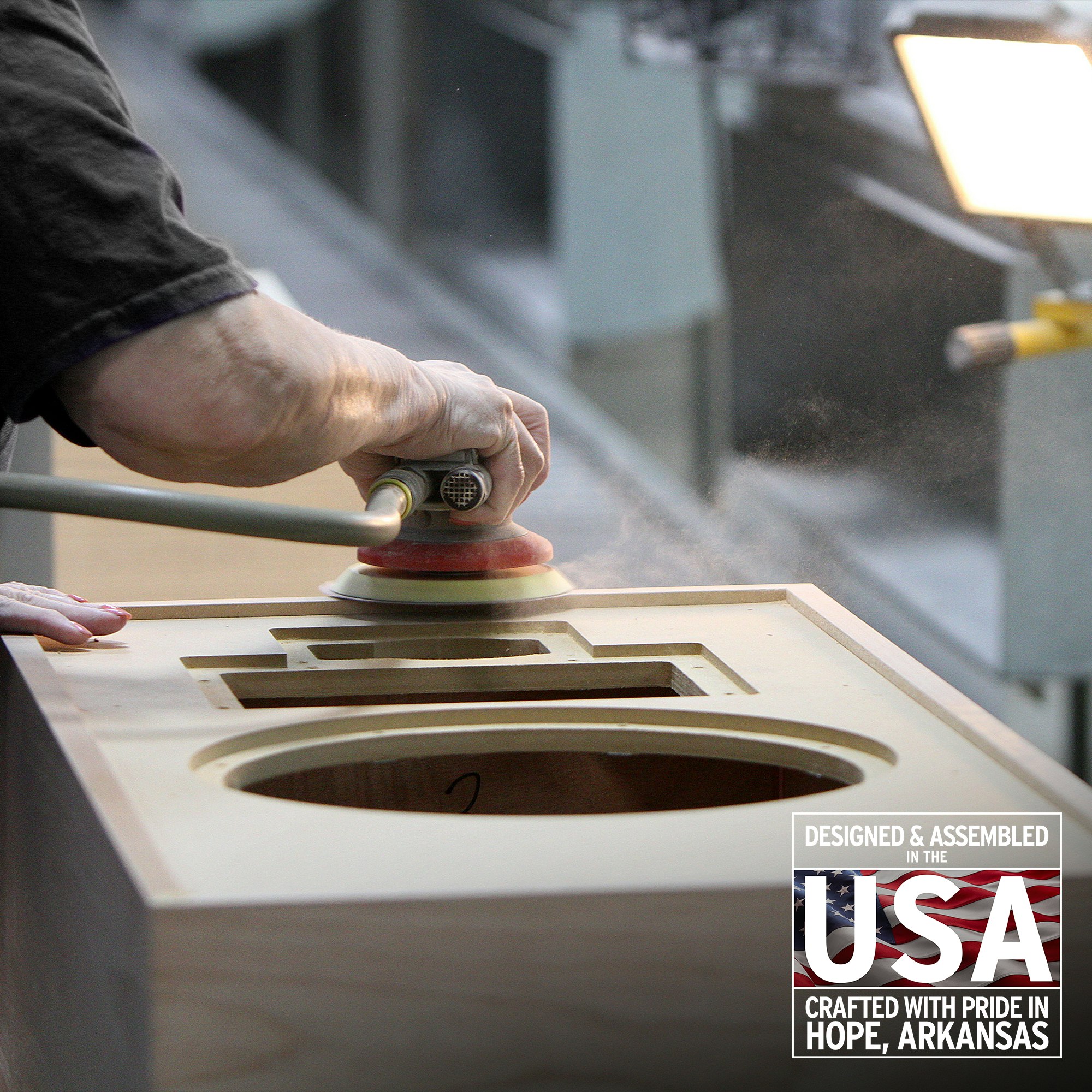 A craftsman in the Klipsch factory sands the cabinet of a Forte speaker. Proudly Designed and Assembled in the USA. Crafted with pride in Hope, Arkansas.